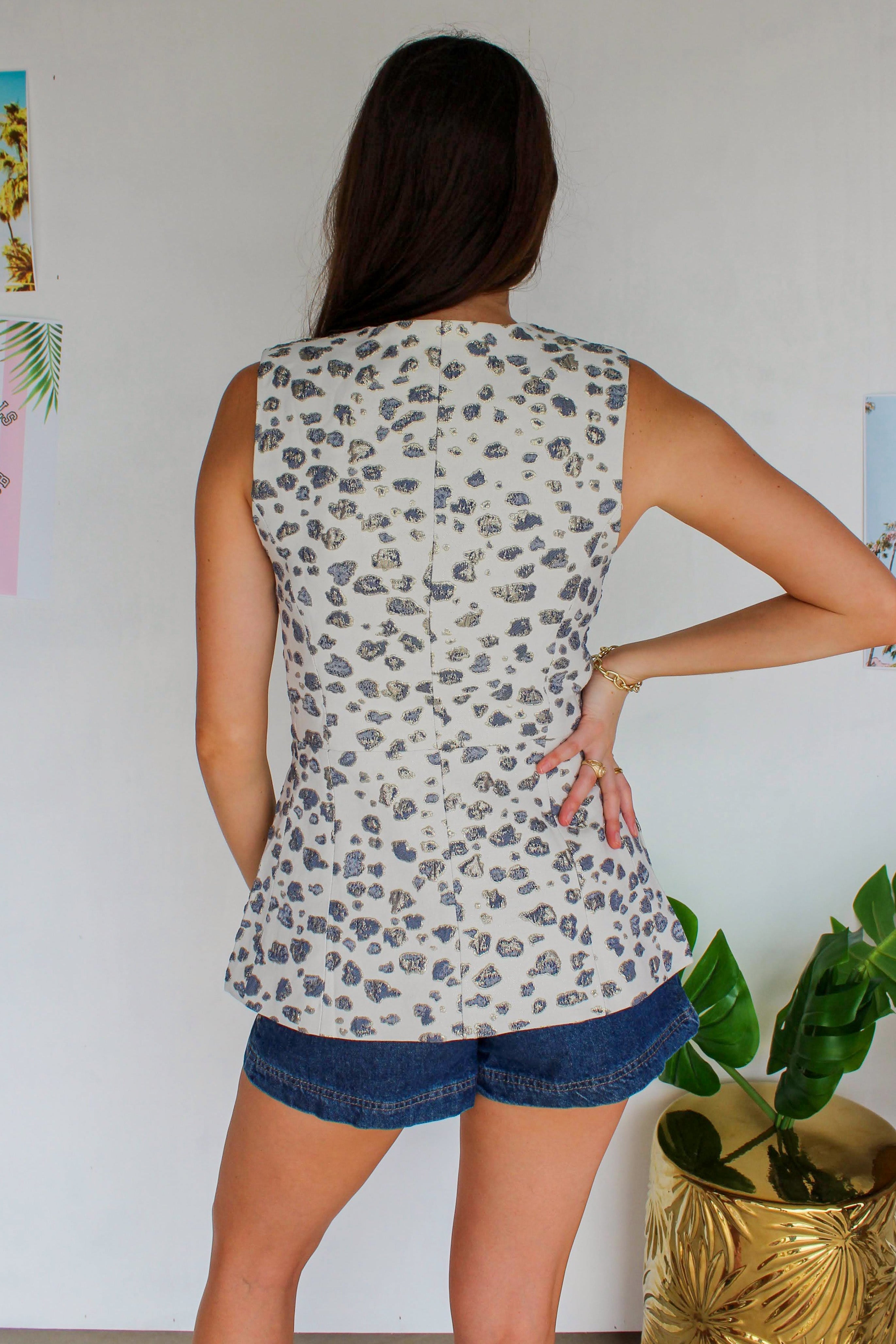 navy and gold leopard vest