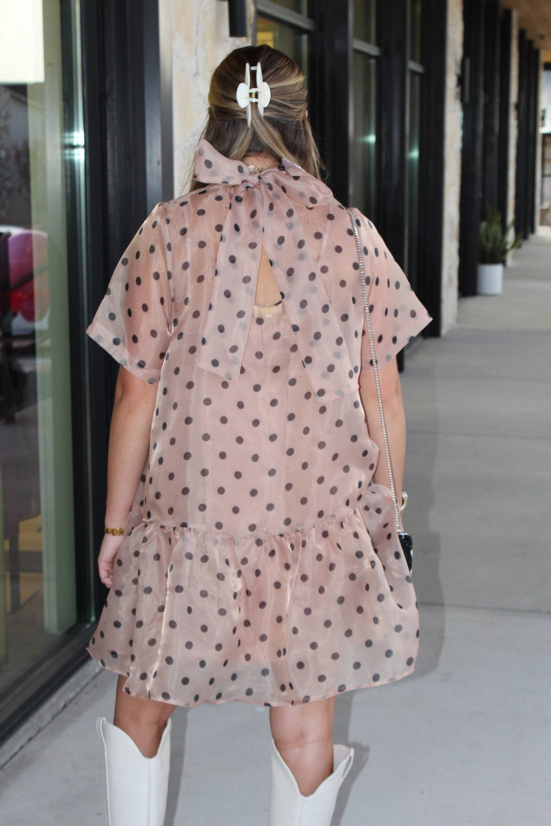 Back of organza polka dot dress showing the bow tie detail