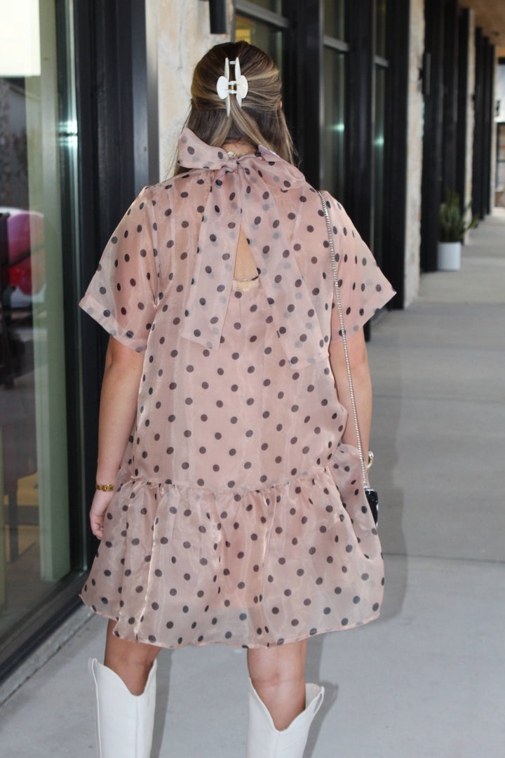 Back of organza polka dot dress showing the bow tie detail