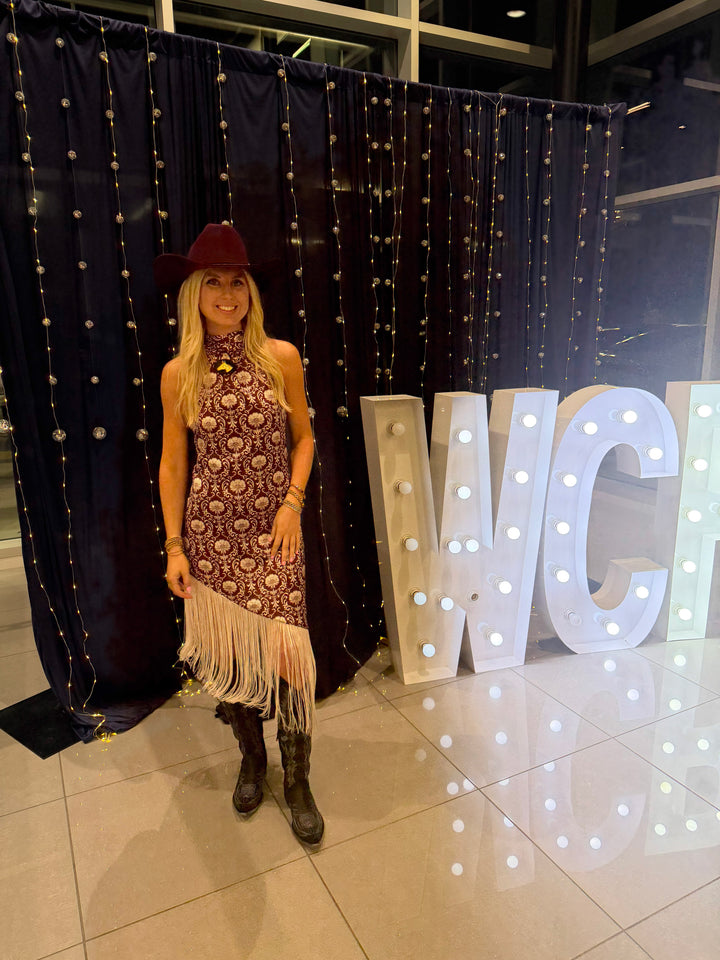 Model wearing dress at an event